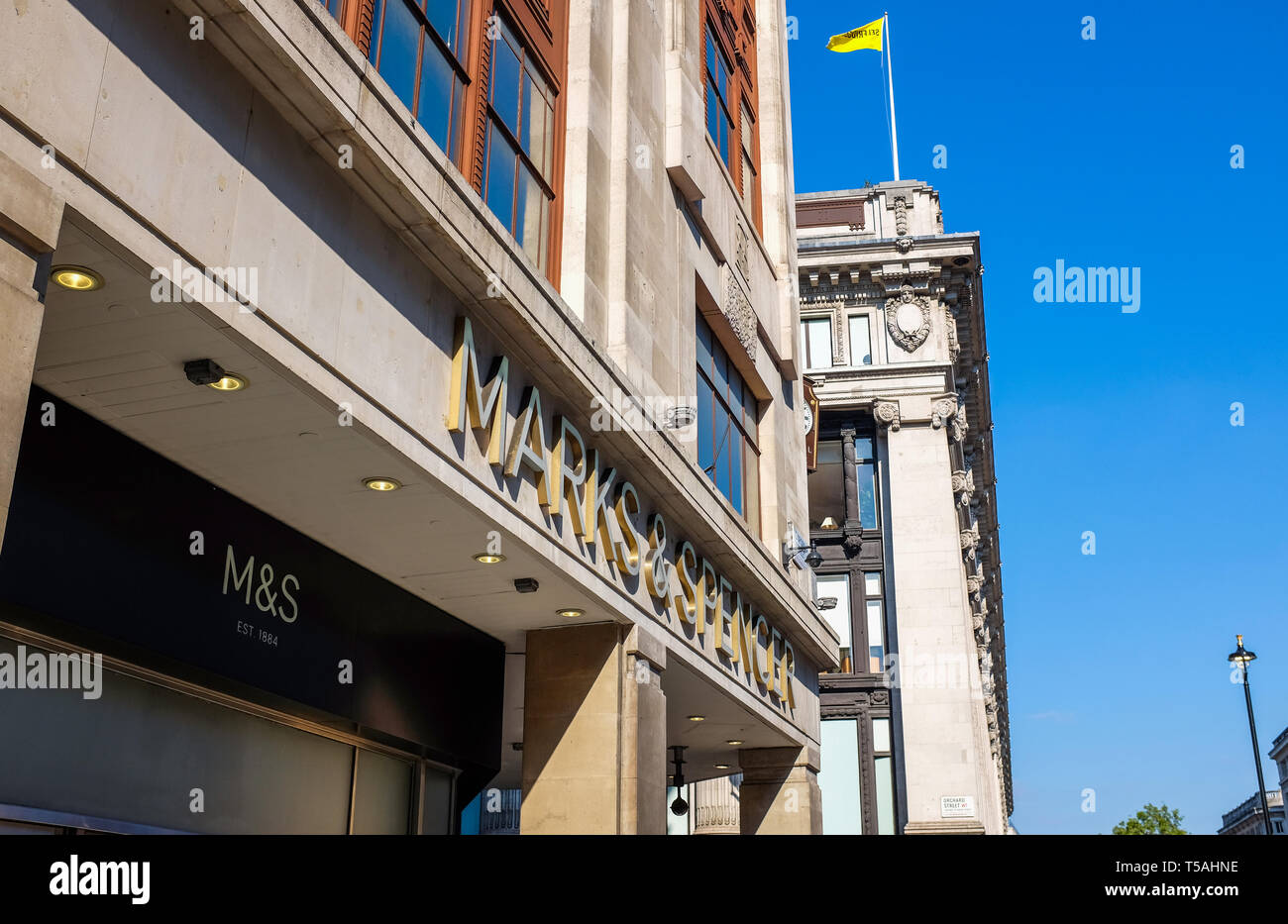 Marks & Spencer store and Selfridges department store next in Oxford Street near Marble Arch London UK Stock Photo