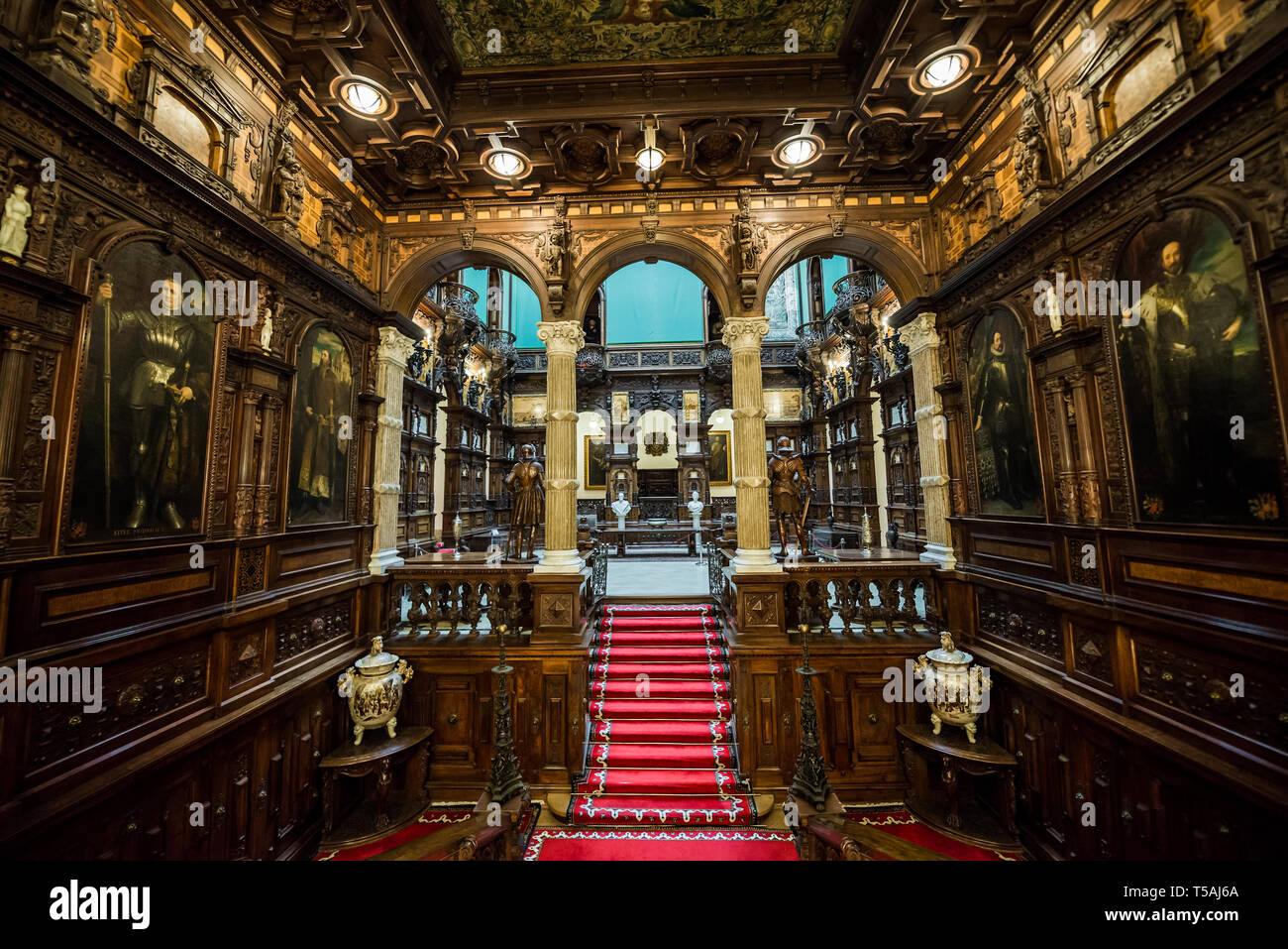Reception Hall stairs and Hall of Honour in Peles Palace, former royal castle, built between 1873 and 1914, located near Sinaia city in Romania Stock Photo