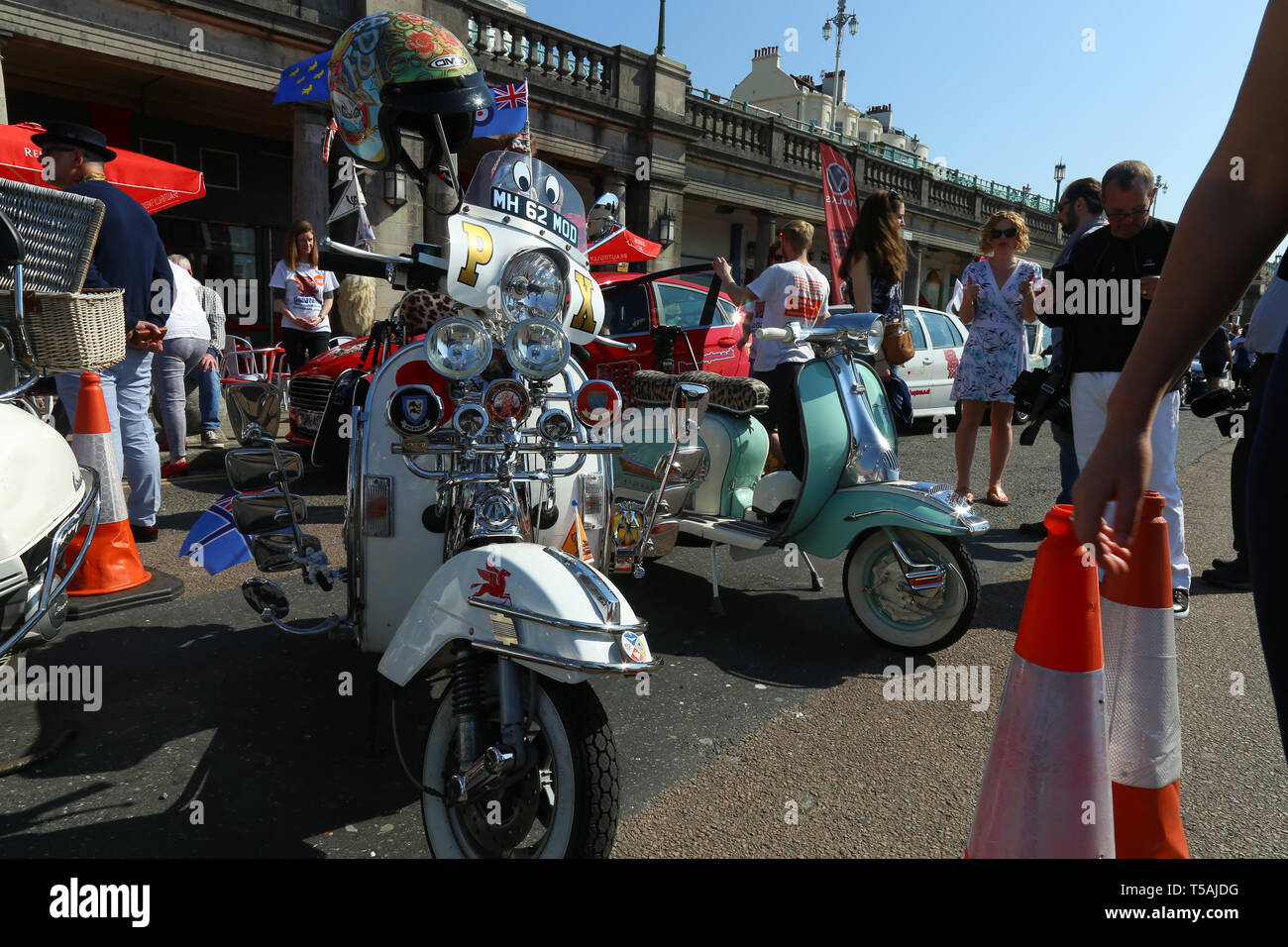 Mod style event with many Vespa scooters decorated with numerous spotlights. Brighton, UK 2019 Stock Photo