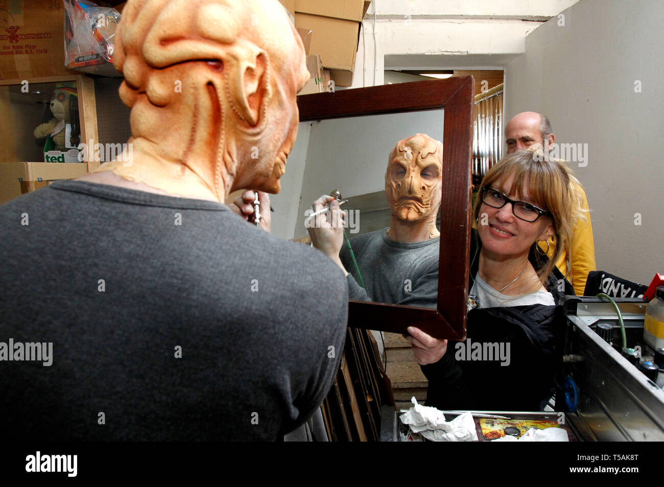 GEEK ART - bodypainting meets SciFi, Fantasy and more: Preparation for the 'Star Trek Discovery' photoshooting with bodypainter Enrico Lein and assistent Maria Skupin at the Filmwelt Center in Bad Muender on April 18, 2019 - A project by the photographer Tschiponnique Skupin and the bodypainter Enrico Lein Stock Photo