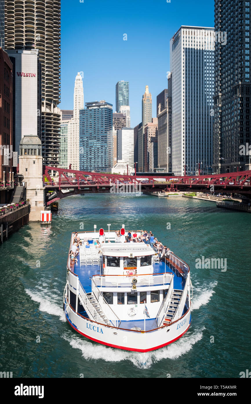 Tourist Ferry on Chicago River just passing Clark Street Bridge in ...
