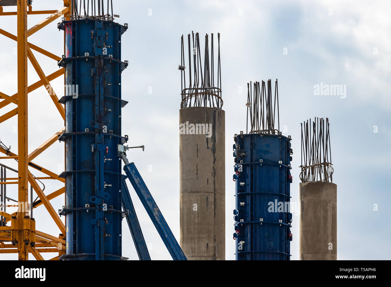 Formwork for pouring concrete .Concrete and iron pillars and frame on