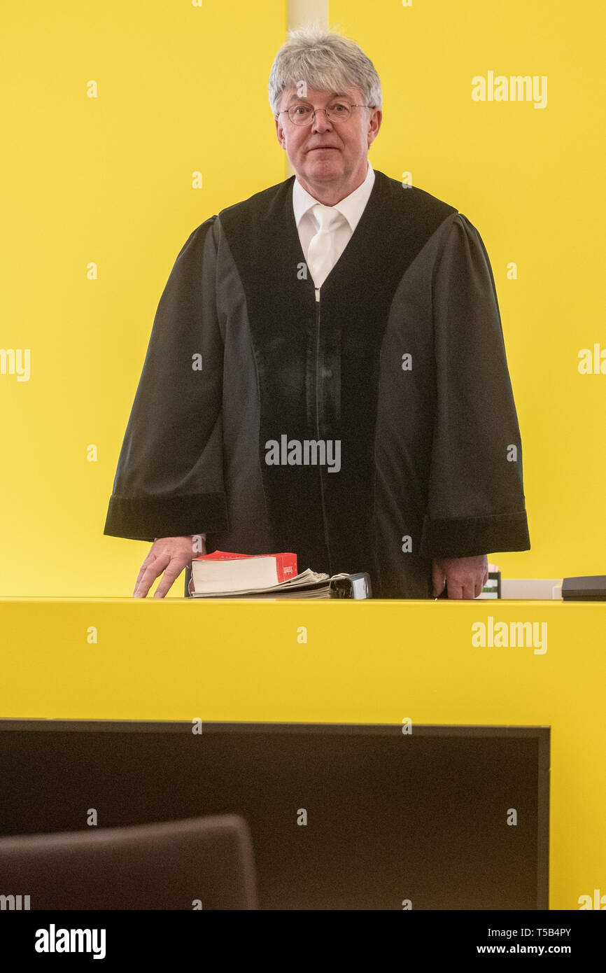 Amberg, Germany. 23rd Apr, 2019. Peter Jung, presiding judge, stands in the courtroom of the district court. Four young refugees have to answer in court because at the end of last year they allegedly attacked indiscriminately passers-by in the city centre of Amberg. Credit: Armin Weigel/dpa/Alamy Live News Stock Photo
