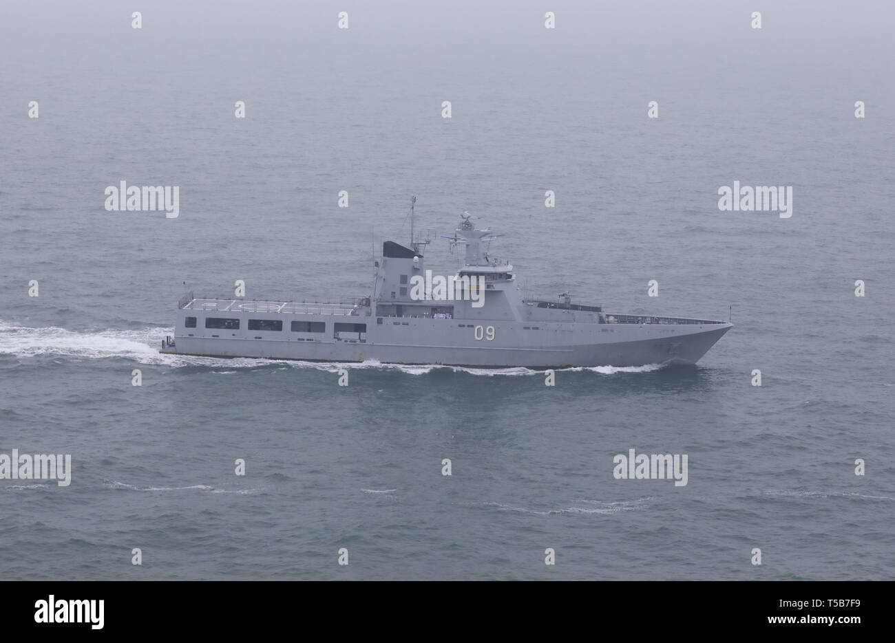 Qingdao. 23rd Apr, 2019. Aerial photo taken on April 23, 2019 shows Royal Brunei Navy offshore patrol ship KDB Daruttaqwa in the waters off Qingdao, east China's Shandong Province. The vessel was here for a naval parade staged to mark the 70th founding anniversary of the Chinese People's Liberation Army (PLA) Navy on Tuesday. Credit: Ju Zhenhua/Xinhua/Alamy Live News Stock Photo