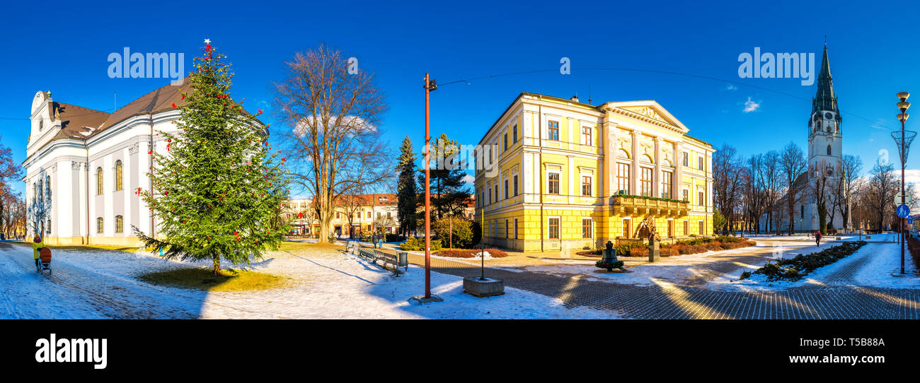 SPISSKA NOVA VES - Jan, 2019 - Historic city center of Spisska Nova Ves covered by snow on Christmas time. Stock Photo