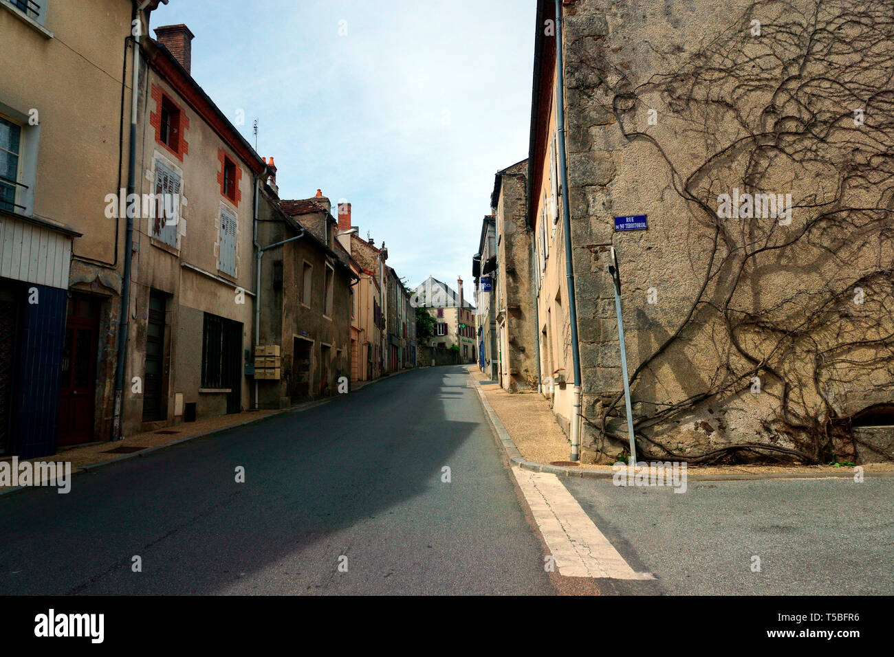 MAGNAC LAVAL, STREET WITH RUE DU 90 TERRITORIAL. Stock Photo