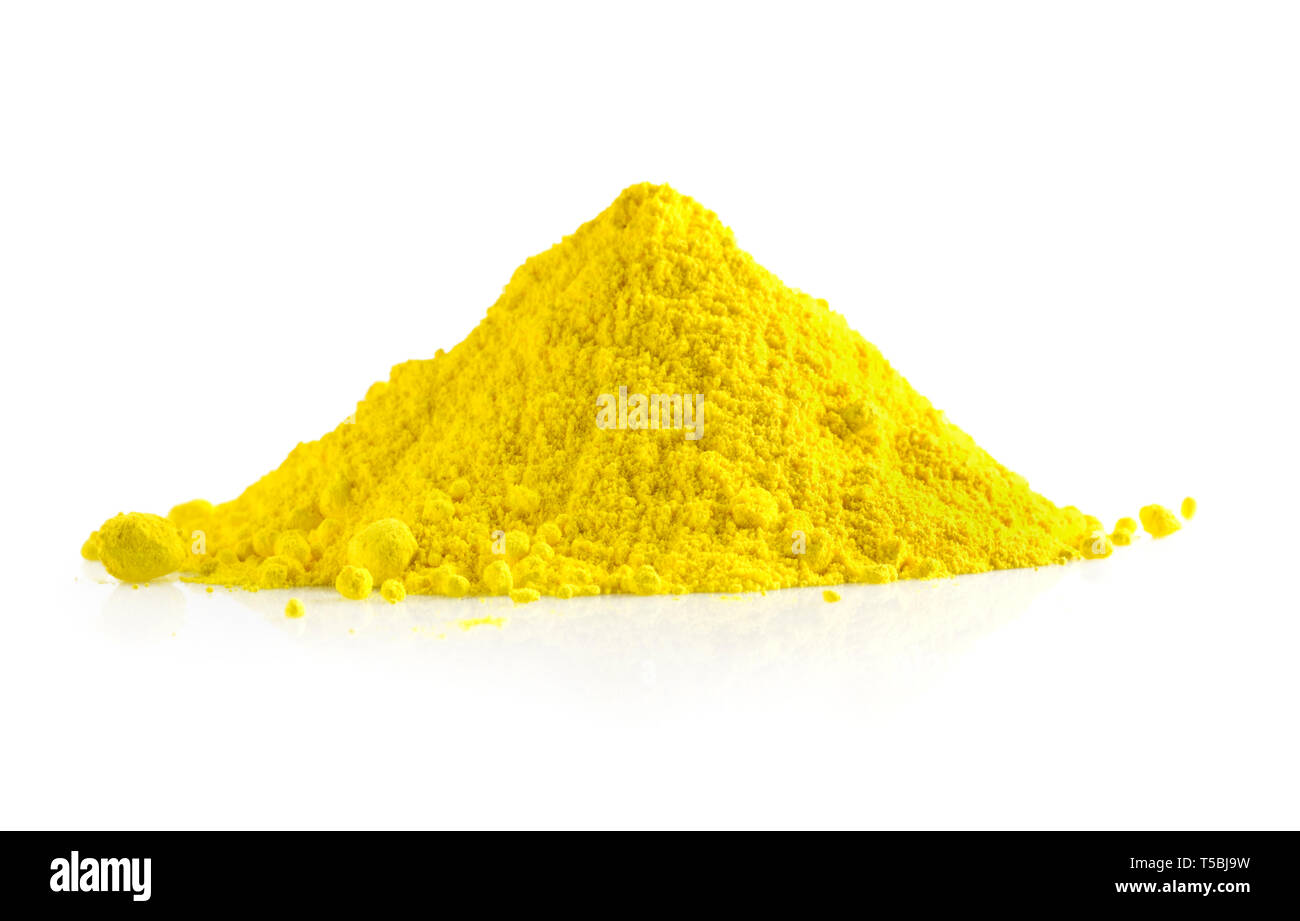 Pile of yellow powder isolated on white background Stock Photo