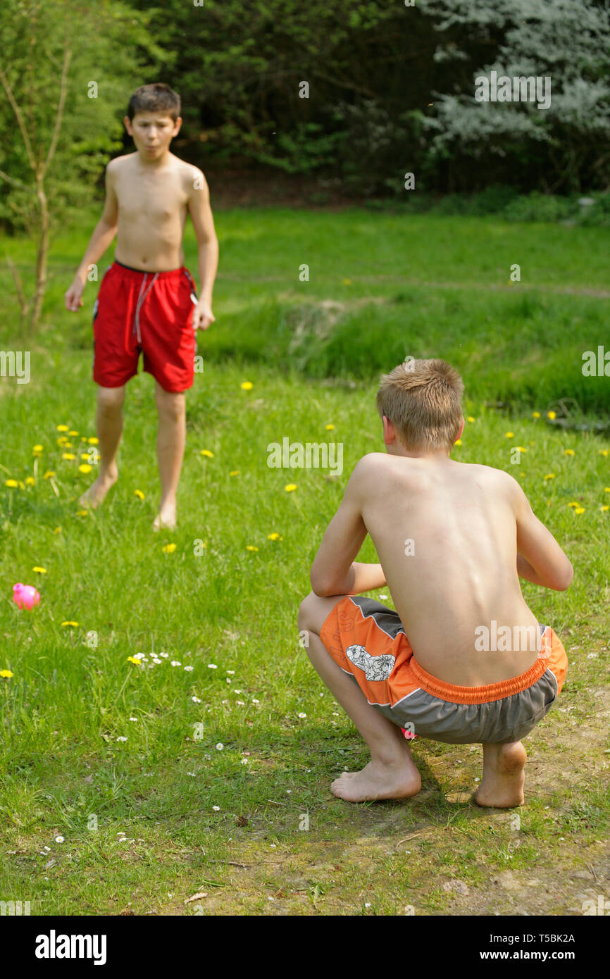 barefoot boys playing in nature Stock Photo - Alamy