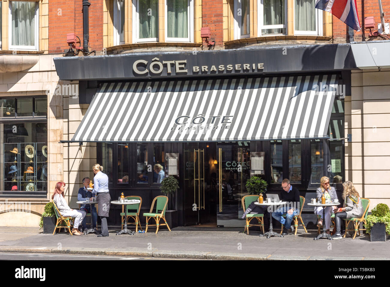 Cote Brasserie French restaurant, Sloane Square, Chelsea, Royal Borough of Kensington and Chelsea, Greater London, England, United Kingdom Stock Photo