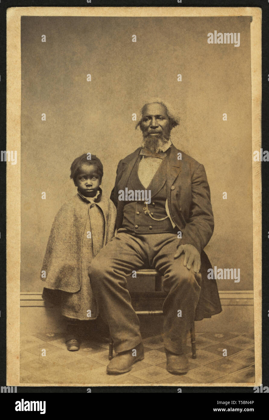 African American Man and Child, Full-length Portrait, by Bundy & Williams, William A. Gladstone Collection of African American Photographs, 1860's Stock Photo