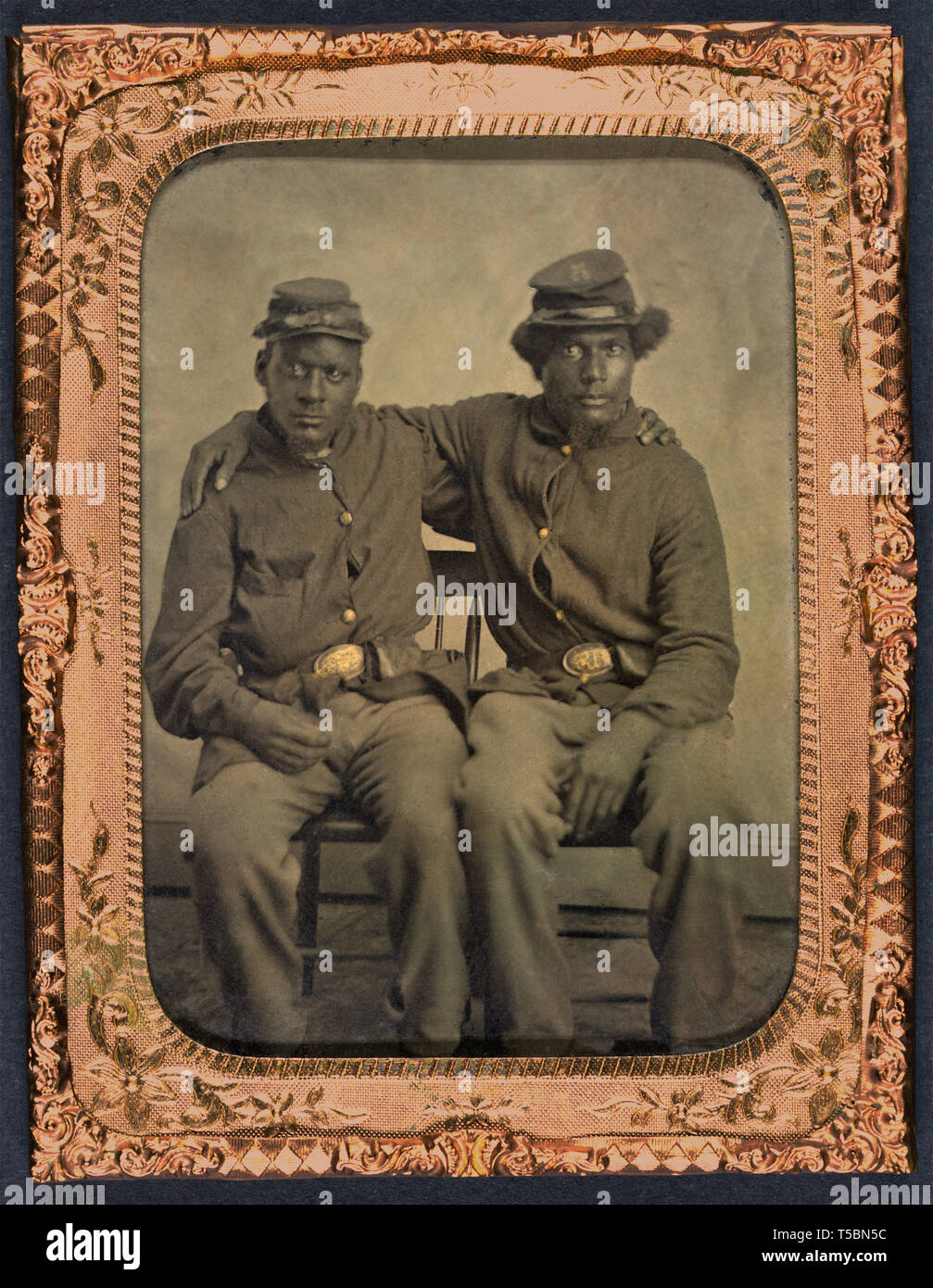 Two African American Union Soldiers, Seated Portrait with Arms around Each other's Shoulders, William A. Gladstone Collection of African American Photographs, 1860's Stock Photo