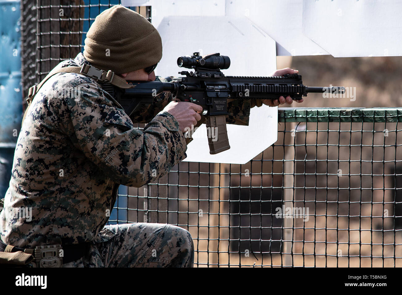 A U.S. Marine completes a course of fire at a range on Marine Corps Base Quanitco, Virginia, March 2, 2019. The Marine Corps’ top shooters gathered in Virginia to participate in Sig Saur Academy’s performance-based training-model to increase combat lethality throughout the Marine Corps. (U.S. Marine Corps photo by Lance Cpl. Britany Rowlett) Stock Photo