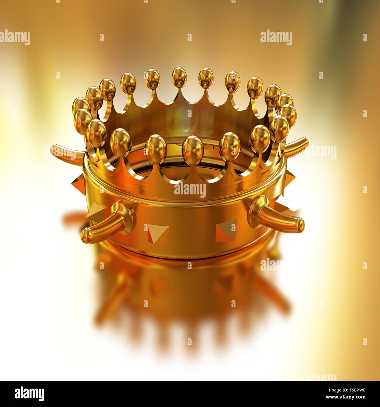 Gold crown isolated on gold background Stock Photo - Alamy