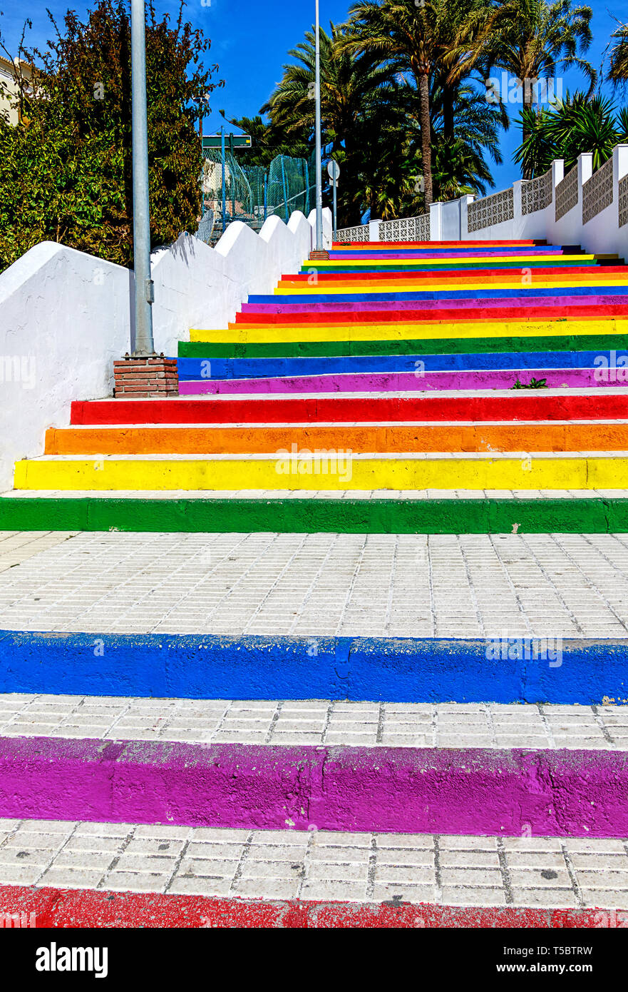 Rainbow color painted stairs to the beach (Playa Torrecilla) in Nerja