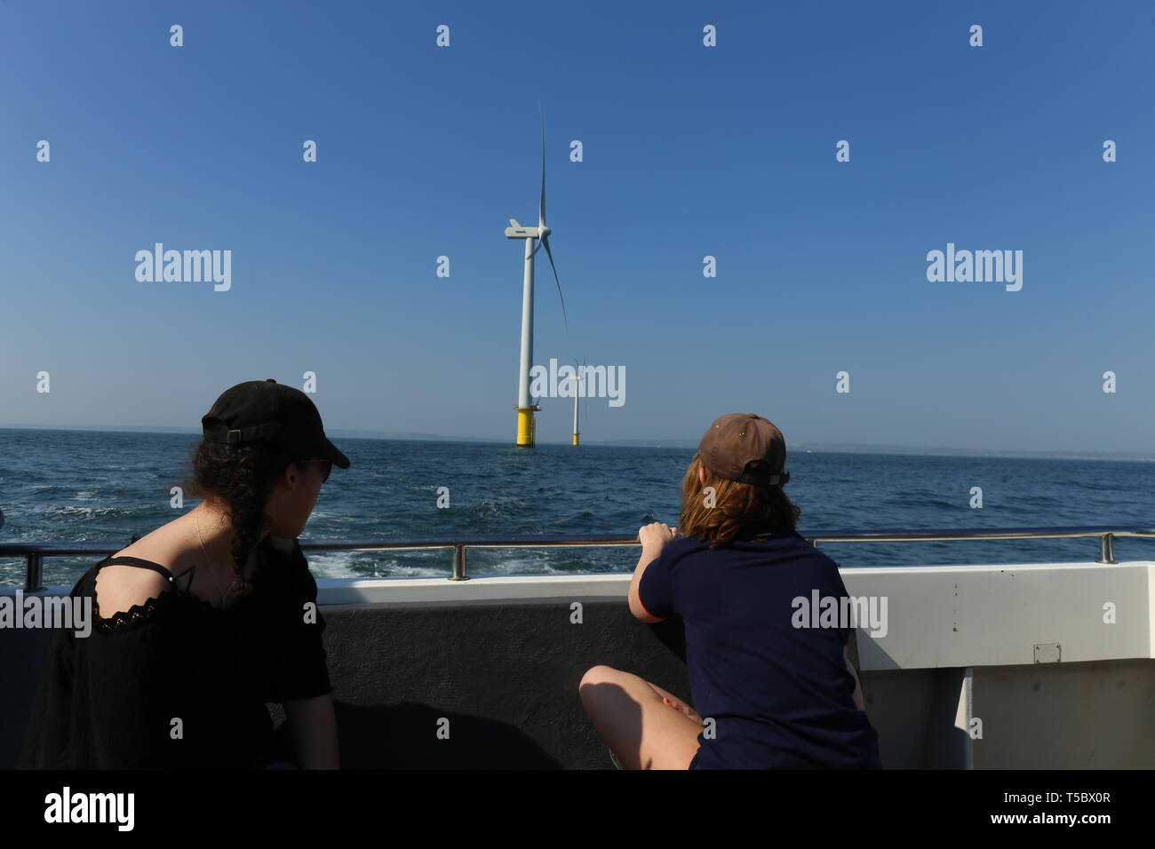 people on the touristic tour on the boat to visit the offshore