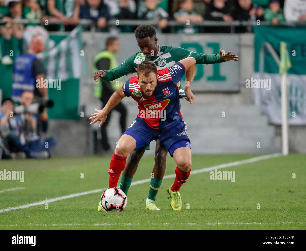 BUDAPEST, HUNGARY - AUGUST 29: (l-r) Tokmac Chol Nguen of Ferencvarosi TC  celebrates his goal in front of Gergo Lovrencsics of Ferencvarosi TC during  the UEFA Europa League Play-off Second Leg match