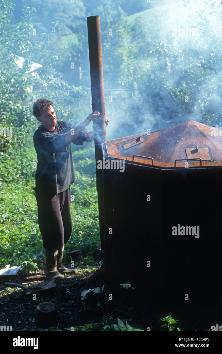 Charcoal burning, UK Stock Photo Alamy
