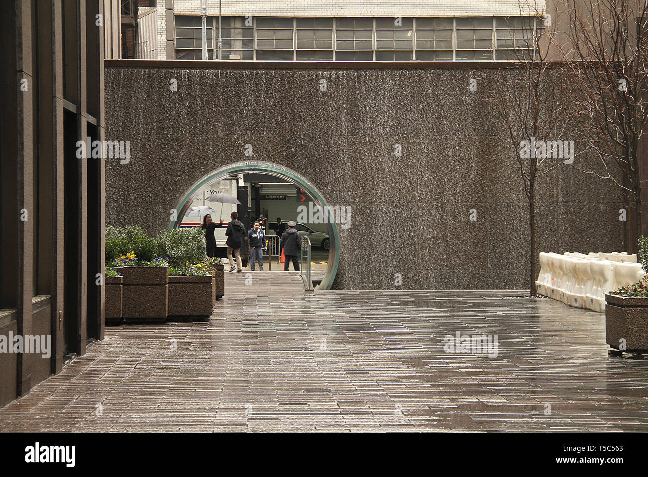 Glass Waterfall Tunnel at the McGrawHill Park in Midtown Manhattan