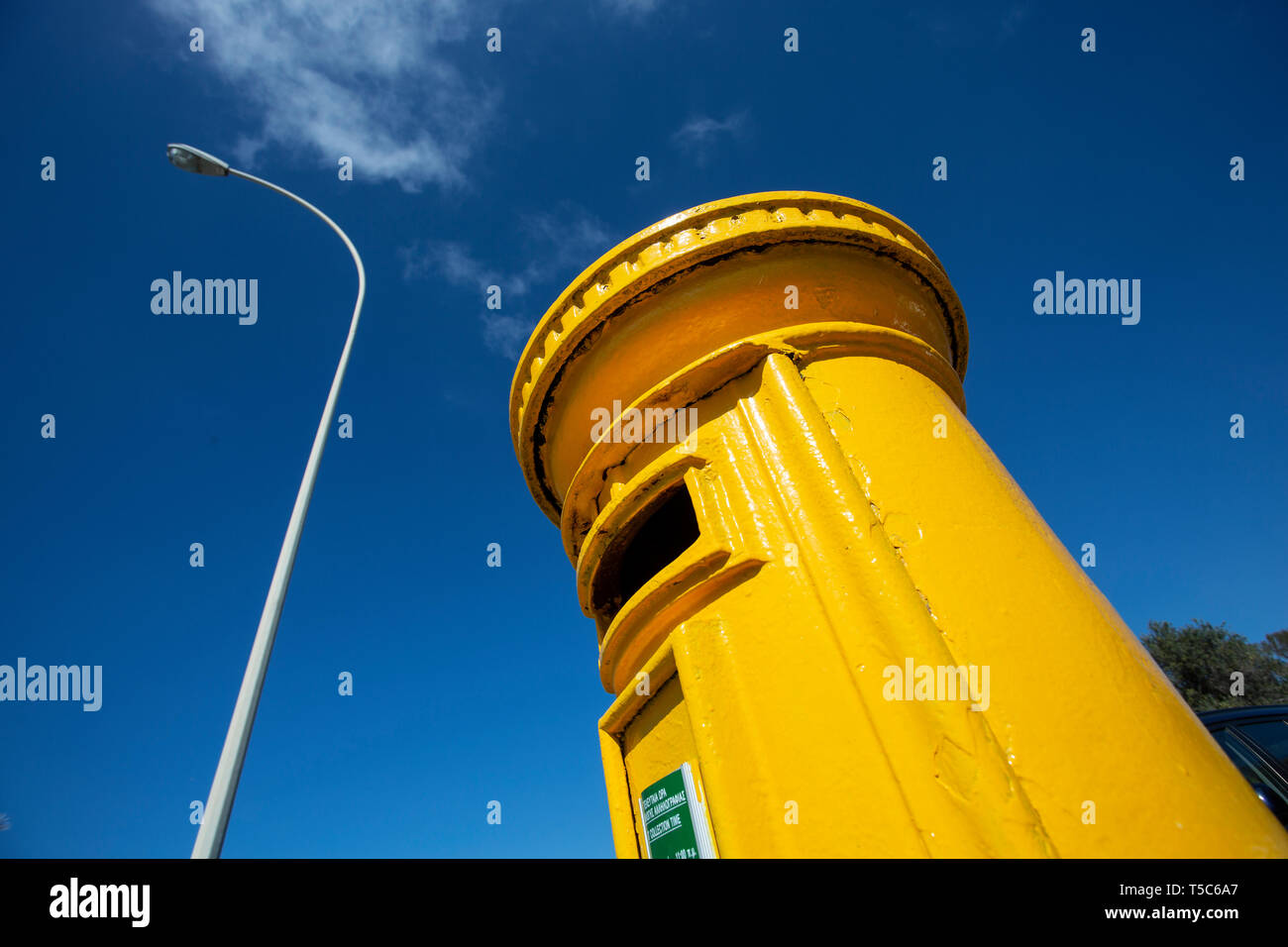 Yellow Post Box, Paphos, Cyprus Stock Photo