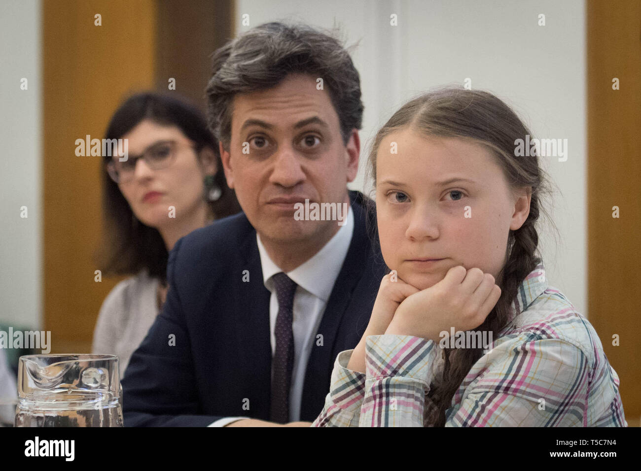 Former Labour leader Ed Miliband (centre) and Swedish climate activist Greta Thunberg (right) at the House of Commons in Westminster, London, to discuss the need for cross-party action to address the climate crisis. Stock Photo