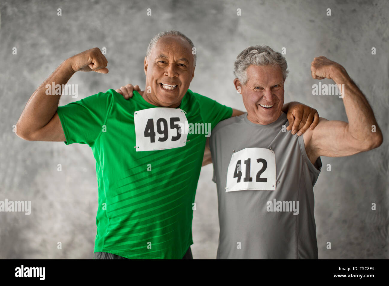 Portrait of two smiling senior men. Stock Photo