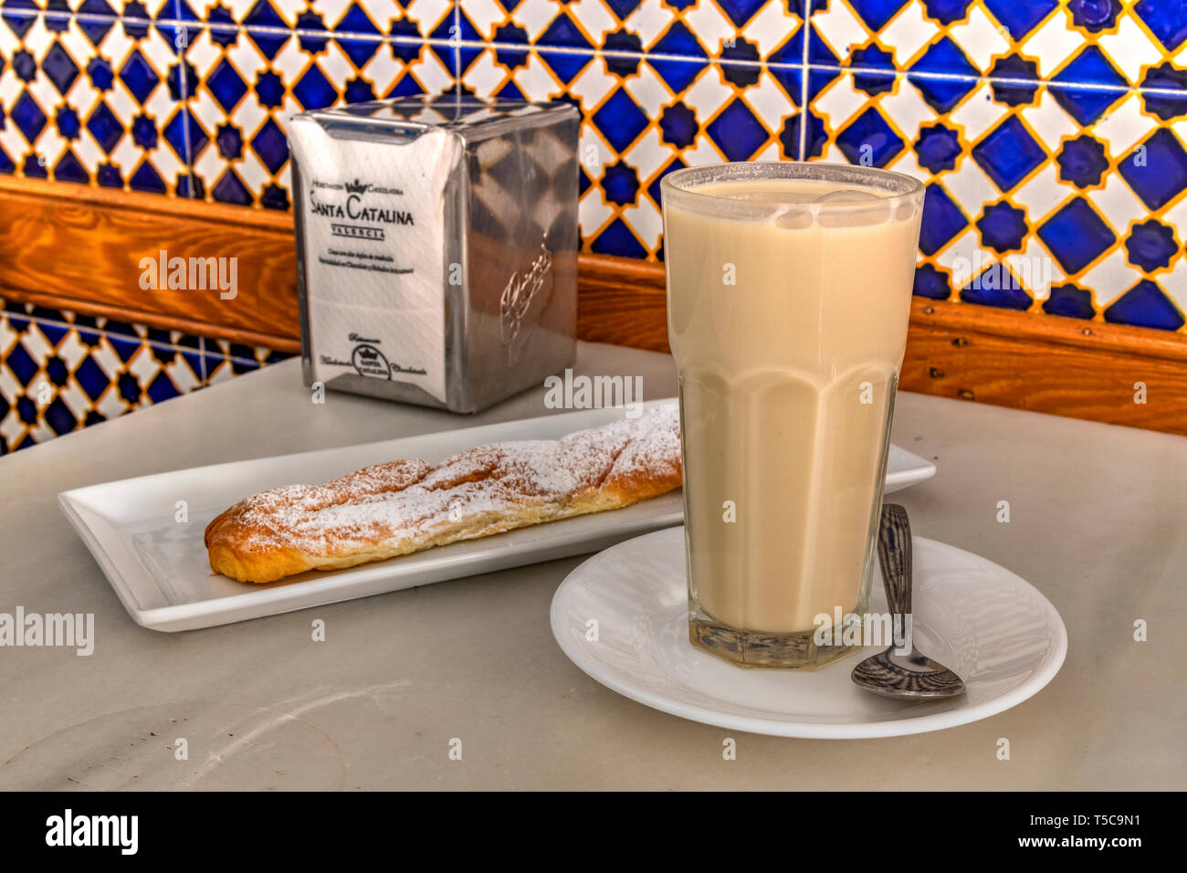 Glass of orchata de xufa and farton sweet, Horchateria Santa Catalina cafe,  Valencia, Comunidad Valenciana, Spain Stock Photo