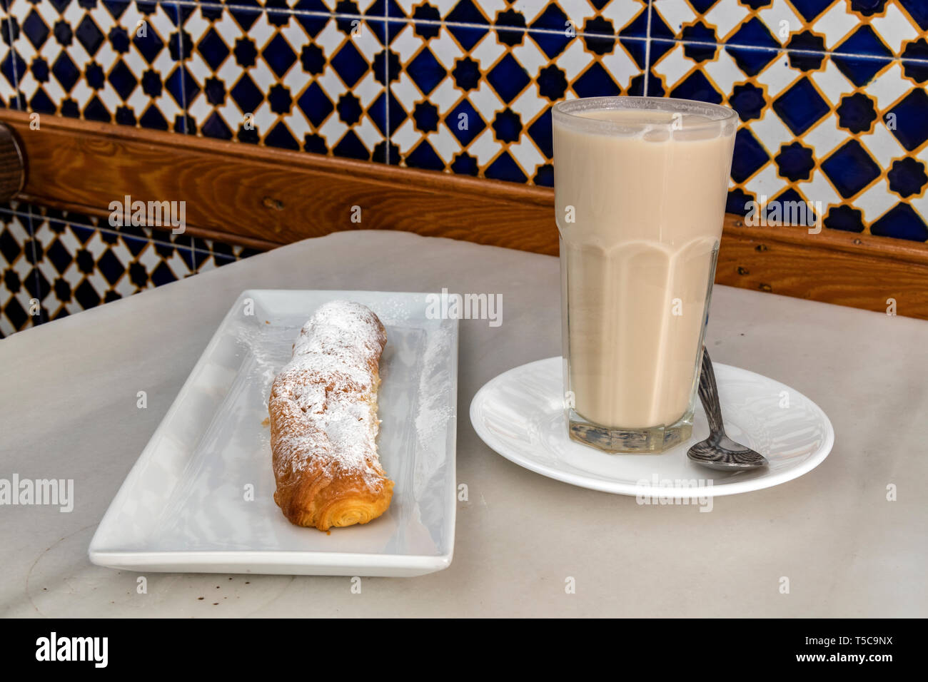 Glass of orchata de xufa and farton sweet, Horchateria Santa Catalina cafe,  Valencia, Comunidad Valenciana, Spain Stock Photo