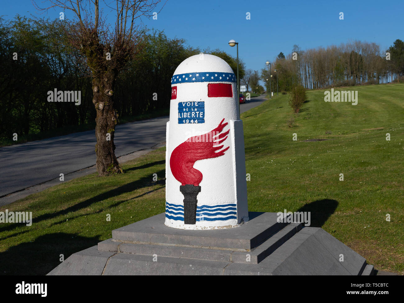 Bastogne, Belgium, April 20, 2019  Milestone of the Liberation Route 'Voie de la Liberte 1944' ,which began in St Mere Eglise, what was the first town Stock Photo