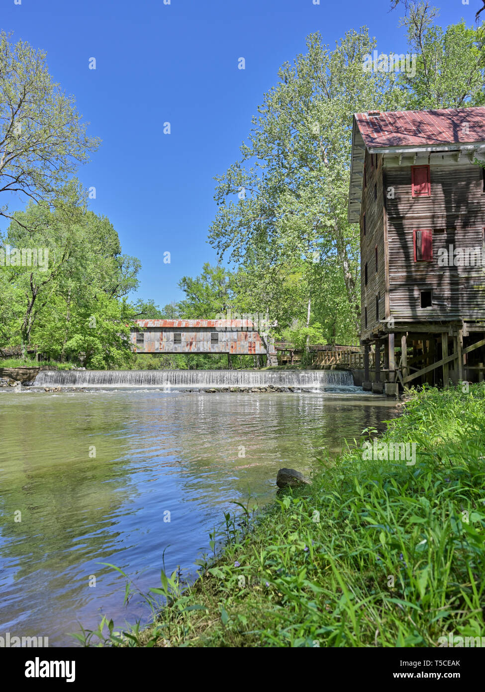Kymulga Grist Mill and covered bridge in Childersburg, Alabama, USA, an outdoor museum and park. Stock Photo