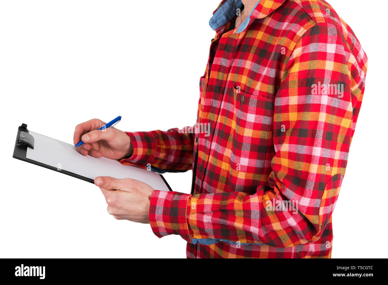 A man holding plastic clipboard with a white booklet Stock Photo - Alamy