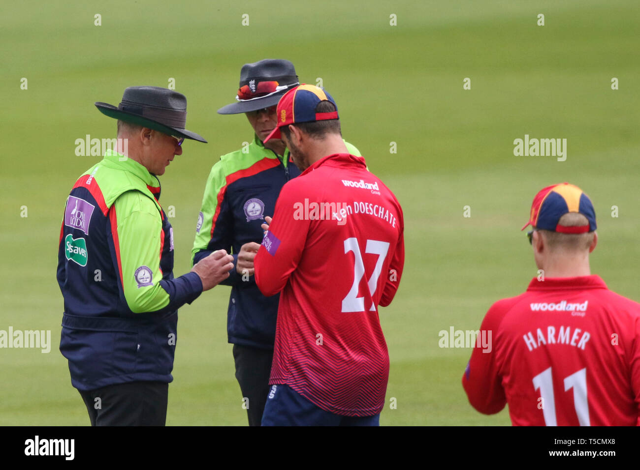 LONDON, UK. 23 April 2019: Umpires Ben Debenham and Mike Burns discuss the condition of the match ball wth captain Ryan ten Doeschate of Essex during the Surrey v Essex, Royal London One Day Cup match at The Kia Oval. Credit: Mitchell Gunn/ESPA-Images Stock Photo