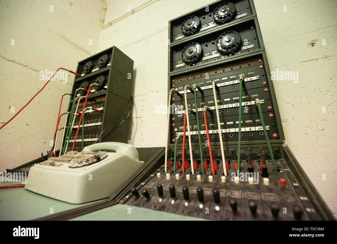 18 April 2019, Rhineland-Palatinate, Alzey: The old telephone exchange in the room of the former government bunker of Rhineland-Palatinate. The branched bunker lies hidden under a school grounds and is not open to the public. Photo: Lukas Görlach/dpa Stock Photo