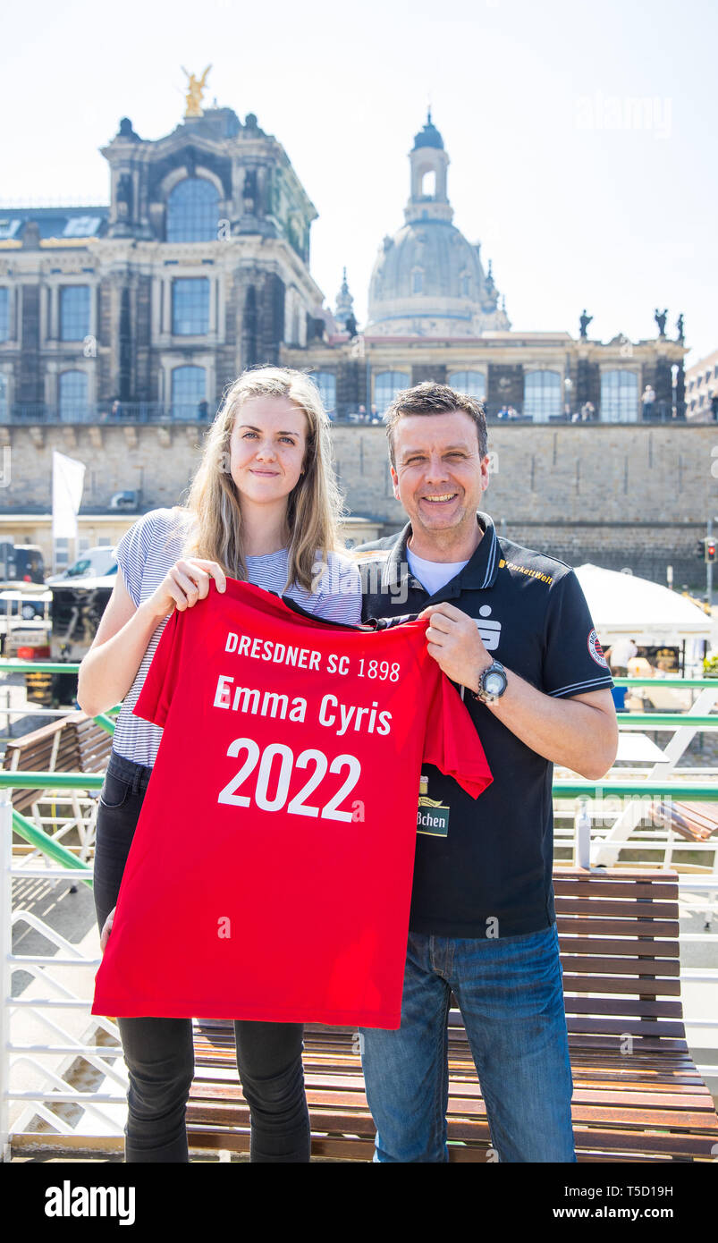Dresden, Germany. 24th Apr, 2019. Emma Cyris, new outside attacker of the volleyball Bundesliga team Dresdner SC, and Alexander Waibl, head coach, pose with a jersey at a press conference. Credit: Oliver Killig/dpa-Zentralbild/dpa/Alamy Live News Stock Photo