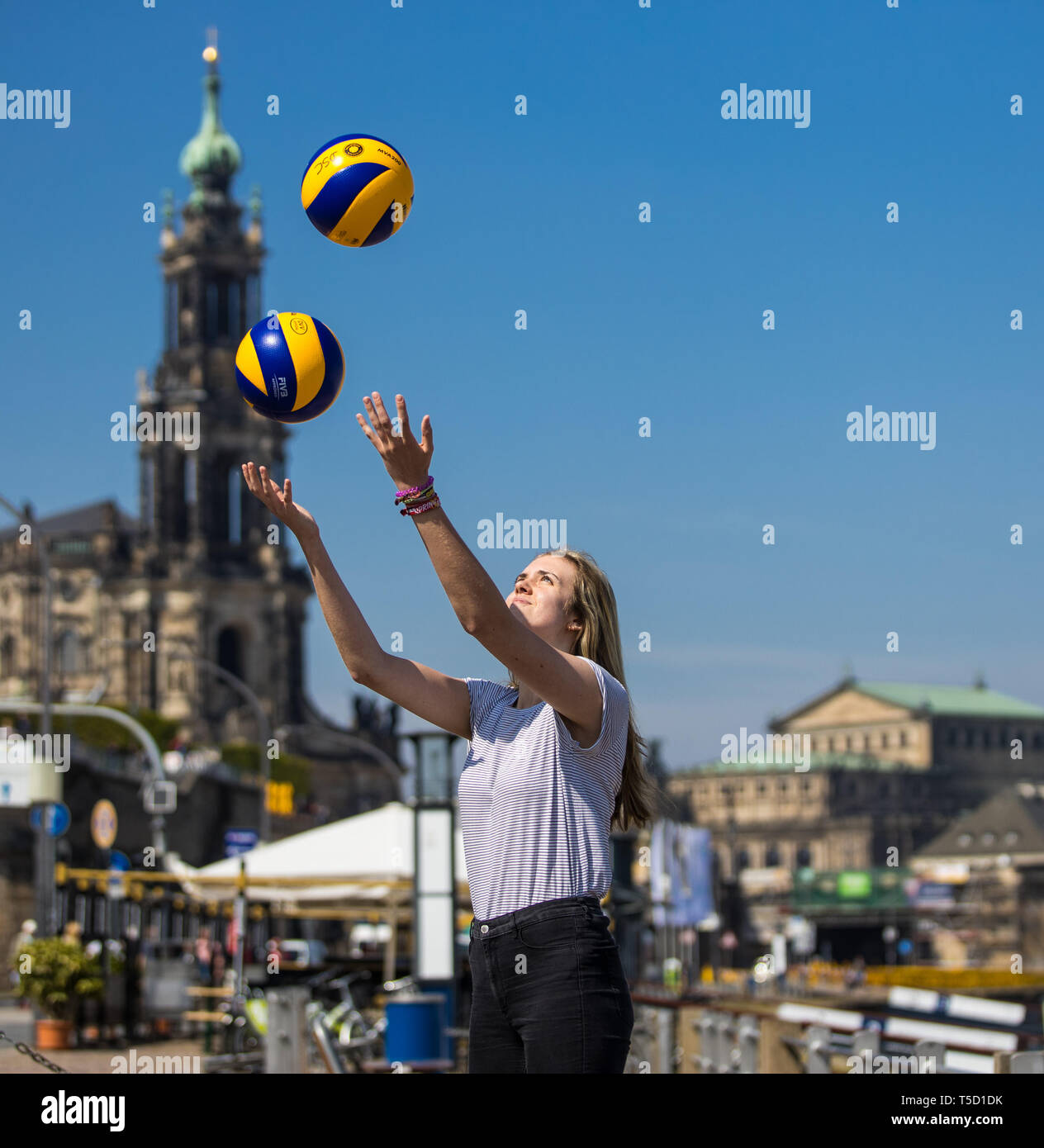 Dresden, Germany. 24th Apr, 2019. Emma Cyris, new outside attacker of the volleyball Bundesliga team Dresdner SC, poses with two volley balls on the sidelines of a press conference. Credit: Oliver Killig/dpa-Zentralbild/dpa/Alamy Live News Stock Photo