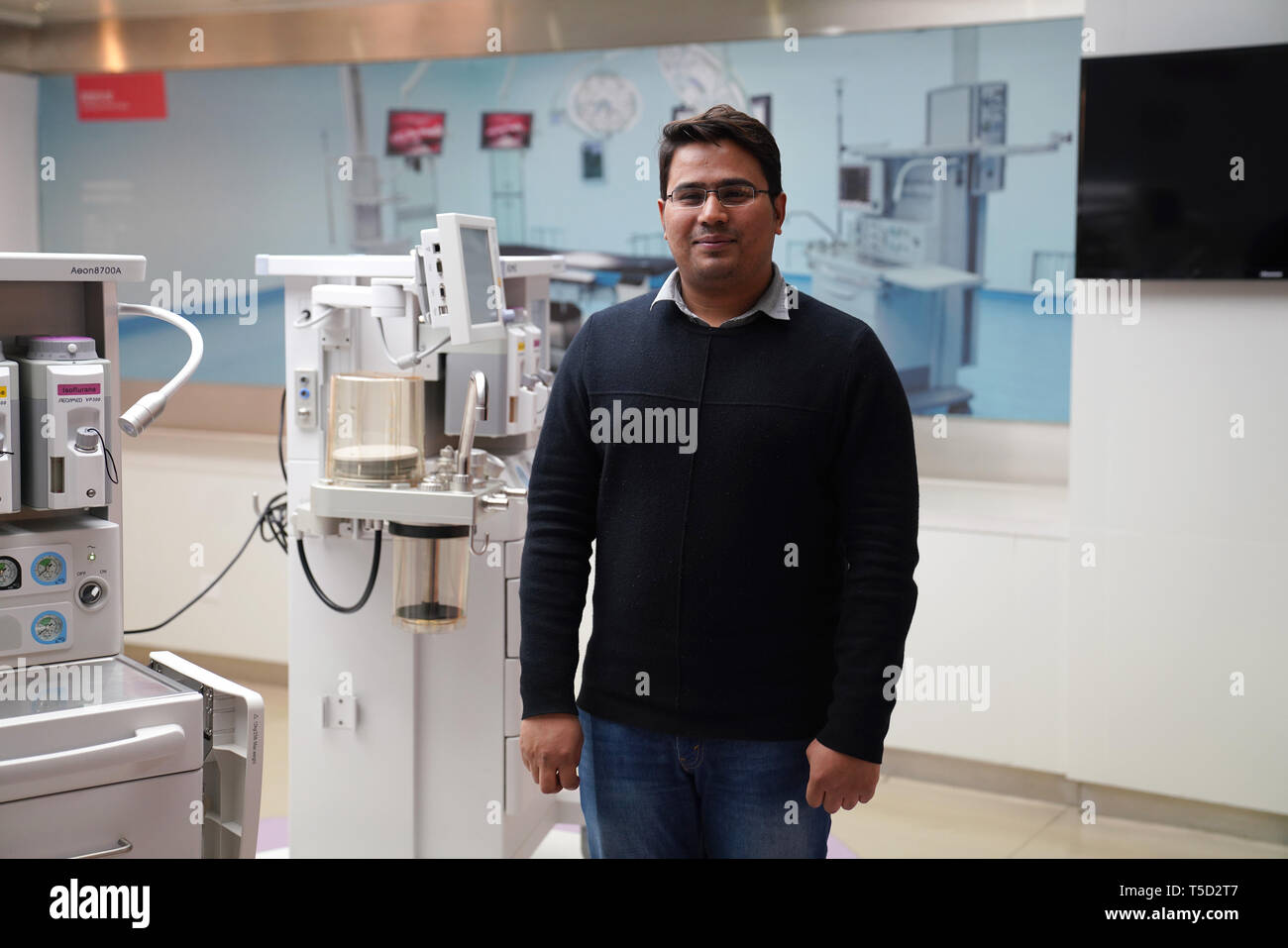 (190424) -- BEIJING, April 24, 2019 (Xinhua) -- Mohsin Ahmad from Pakistan stands in the product demonstration room of Beijing AeonMed Co., Ltd. where he works in Beijing, capital of China, April 4, 2019. Mohsin Ahmad, 27, came to study mechanical engineering in Beijing Institute of Technology in 2016. He became an after-sales engineer in AeonMed, responsible for the product maintenance for Asian-Pacific region. He got married with an Indonesian girl he met in China. He plans to stay in China for 10 years and then return to Pakistan or Indonesia. With the proposal of Belt and Road Initiative, Stock Photo