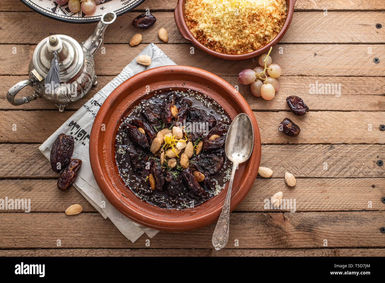 Slow cooked beef tajine with dates, raisins and almonds moroccan