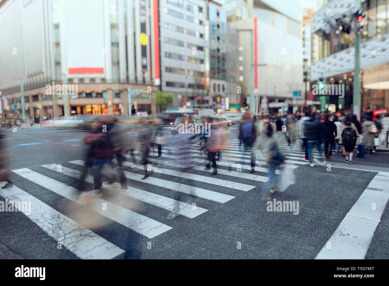 People walking in pedestrian crossing in Osaka Stock Photo