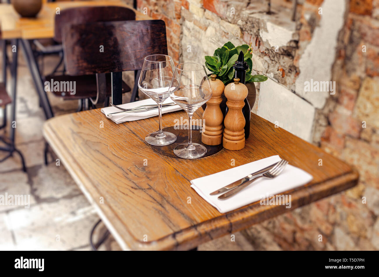 Tables in the restaurant in the open air. Stock Photo