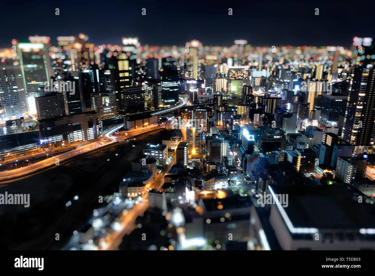 Night skyline of Osaka city. Umeda Sky Building in Japan. Stock Photo
