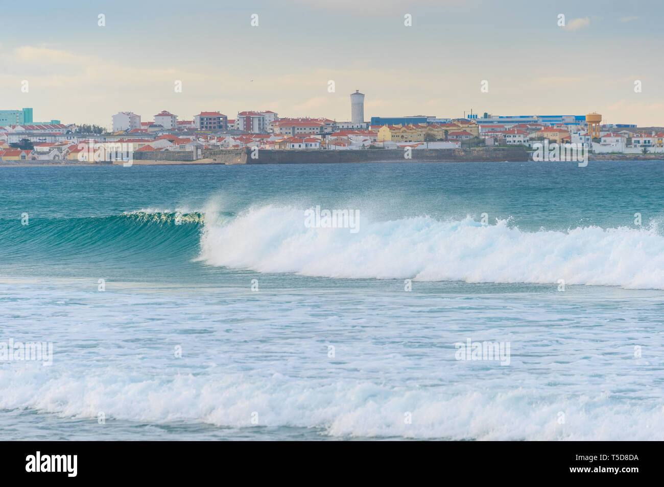 Skyline of Peniche - coastal town in Portugal. Atlantic ocean in the foreground Stock Photo