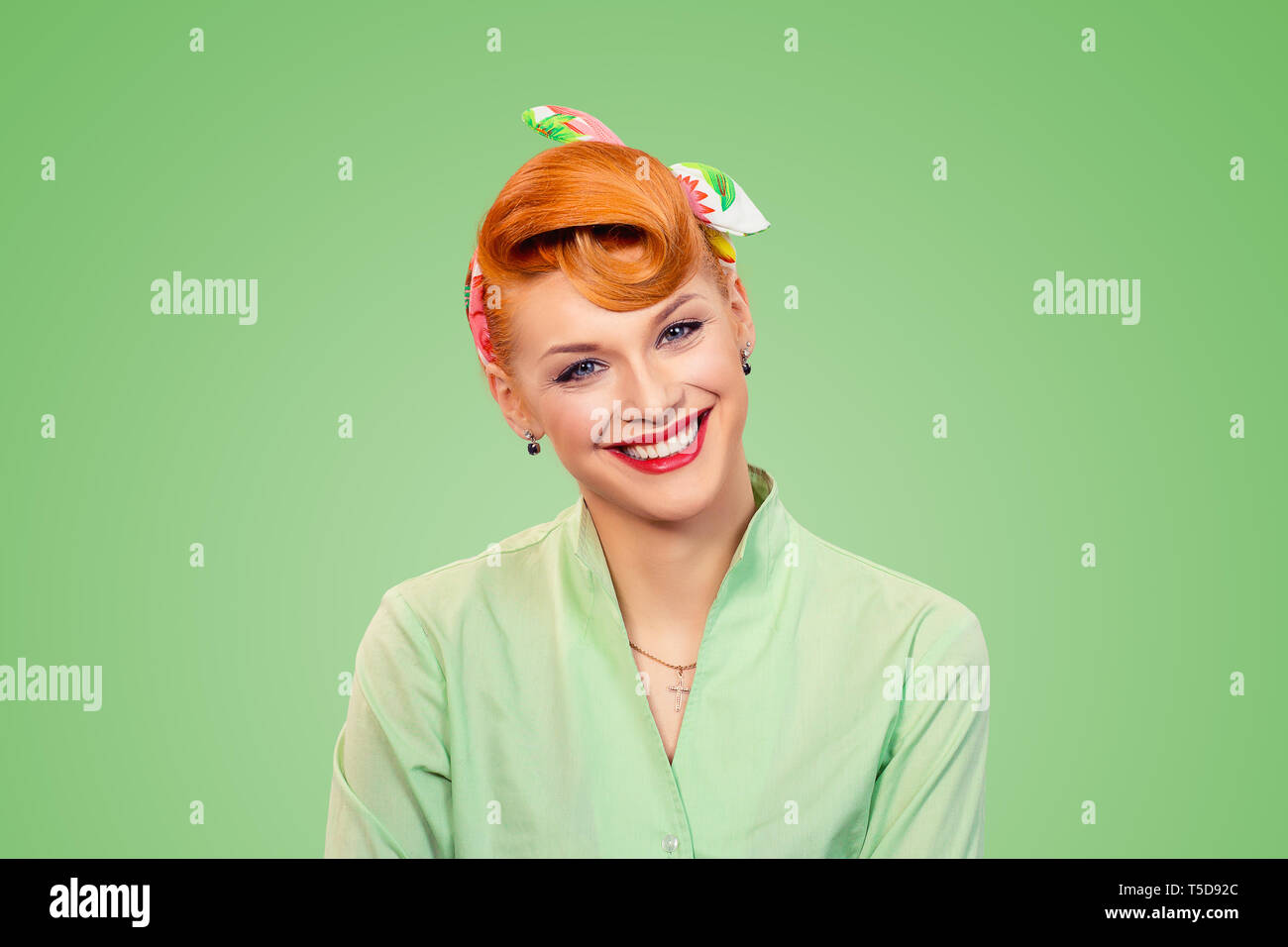 Success. Closeup portrait beautiful radiant businesswoman looking at you  camera isolated green background wall. Pinup girl retro vintage clothing  50' Stock Photo - Alamy