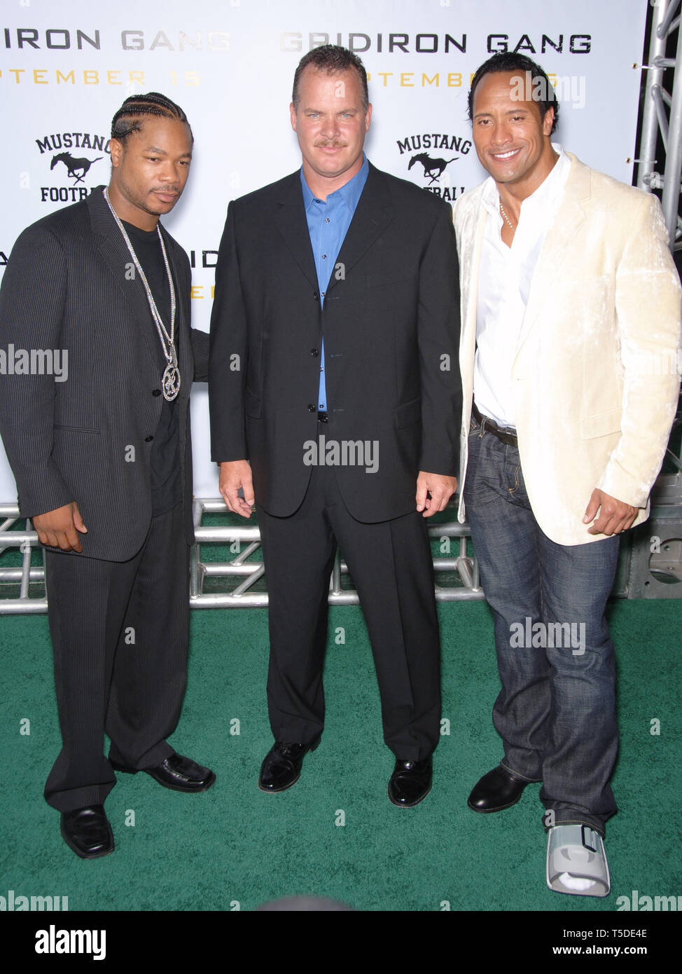 LOS ANGELES, CA. September 05, 2006: Actors DWAYNE JOHNSON, aka "The ROCK",  & ALVIN JOINER, aka "XZIBIT", with probabtion officer & subject of the  movie SEAN PORTER (centre) at the Los Angeles