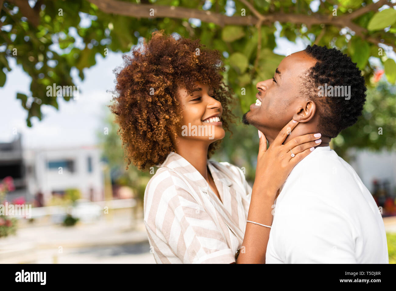 Outdoor Protrait Of Black African American Couple Kissing Each Other
