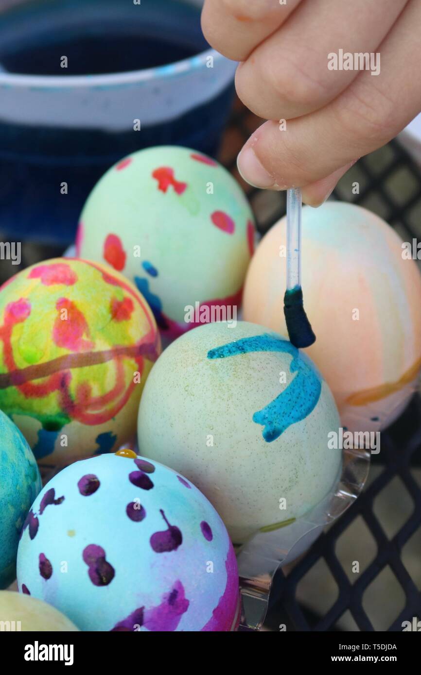 Portrait of easter eggs being decorated Stock Photo