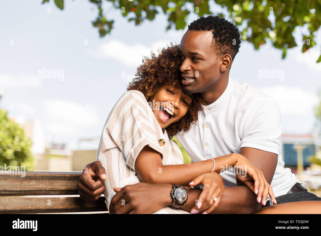 Outdoor protrait of black african american couple embracing each other ...