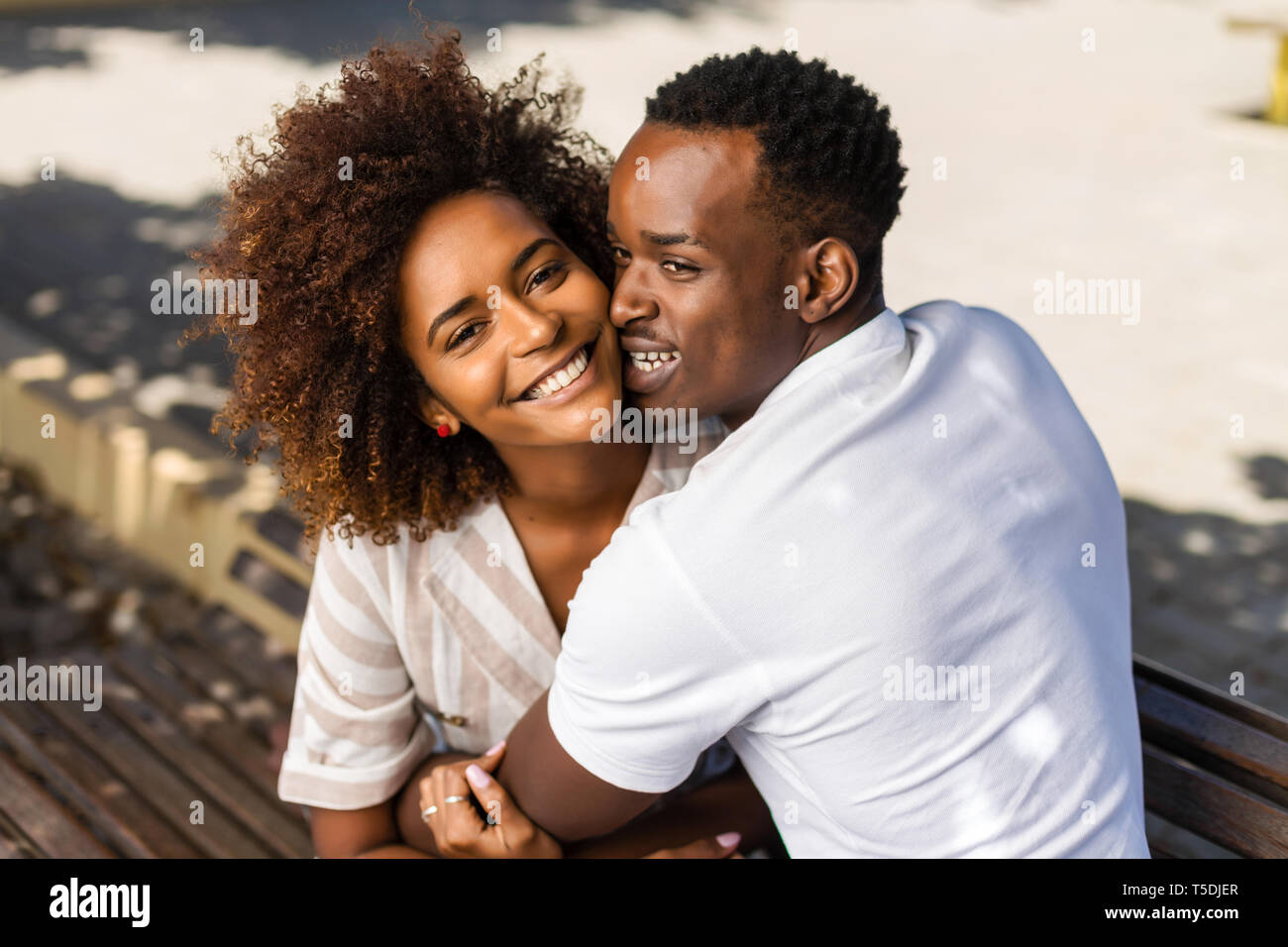 Outdoor protrait of black african american couple embracing each other ...