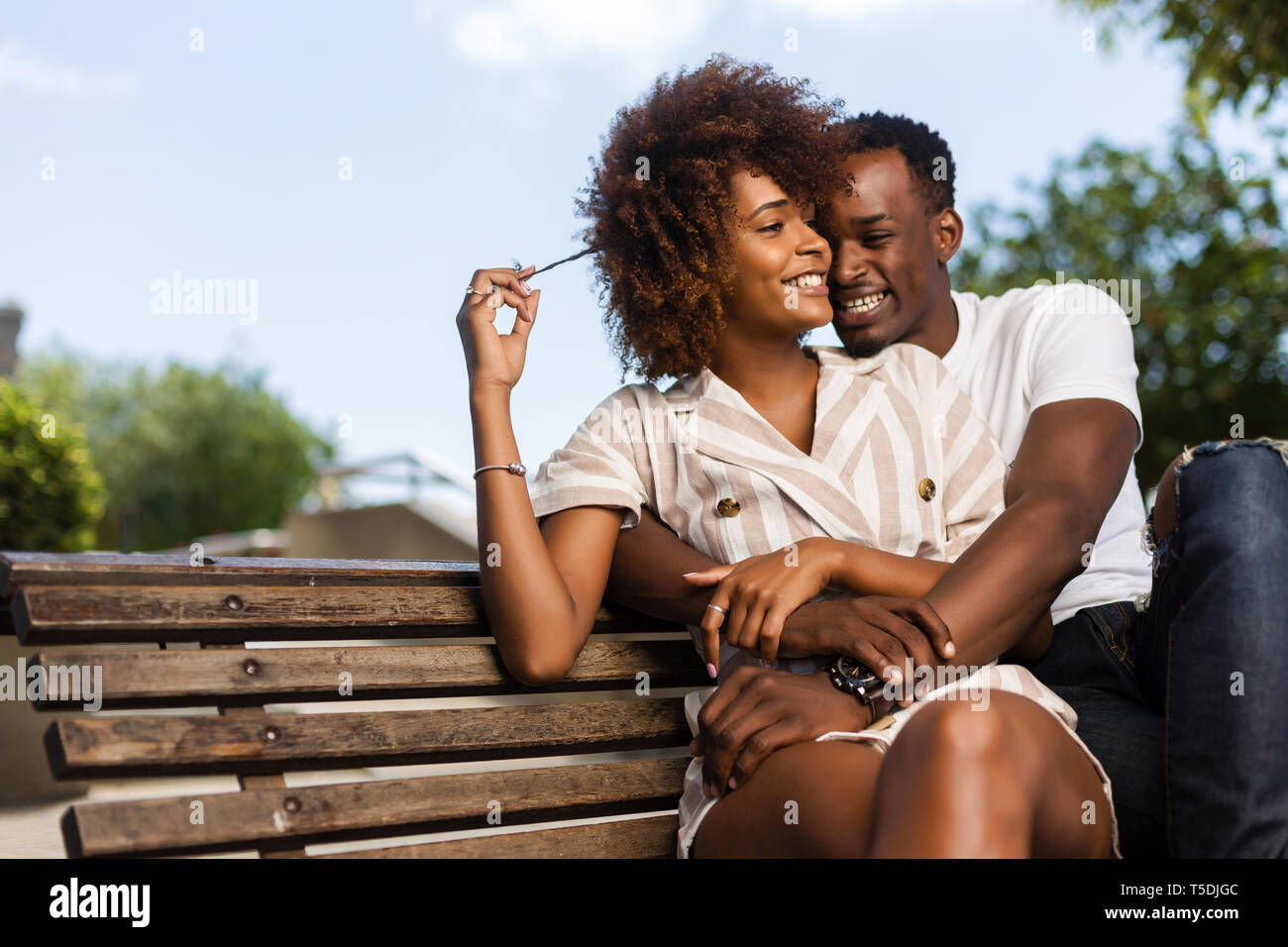 Outdoor protrait of black african american couple embracing each other ...