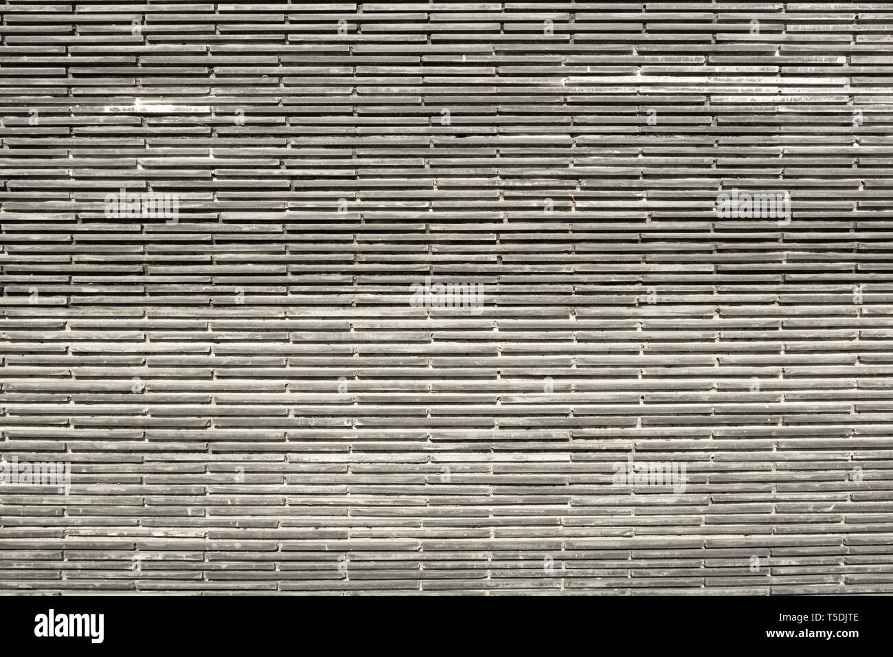 Old gray brick wall texture background , graphic ressource . Stock Photo
