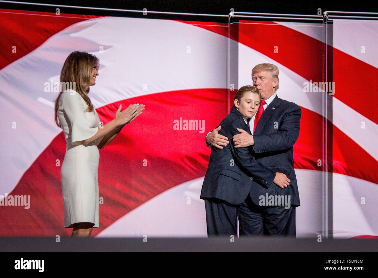 Melania Trump, Donald J. Trump and their son Barron celebrate on stage  after Donald Trump was officially nominated as Republican Presidential  Candidate at the Republican National Convention in Cleveland Stock Photo -