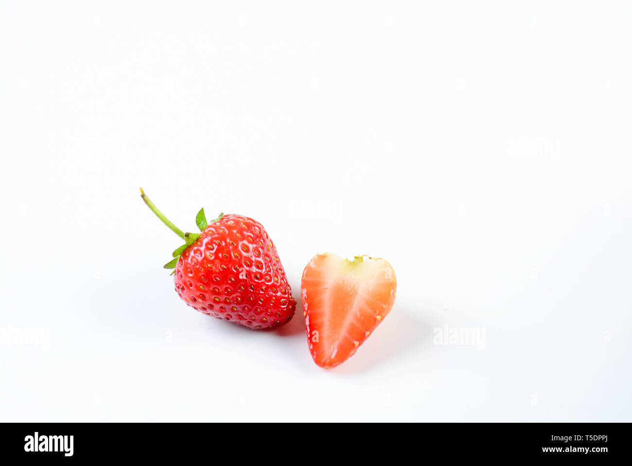 Fresh strawberries on white background Stock Photo - Alamy
